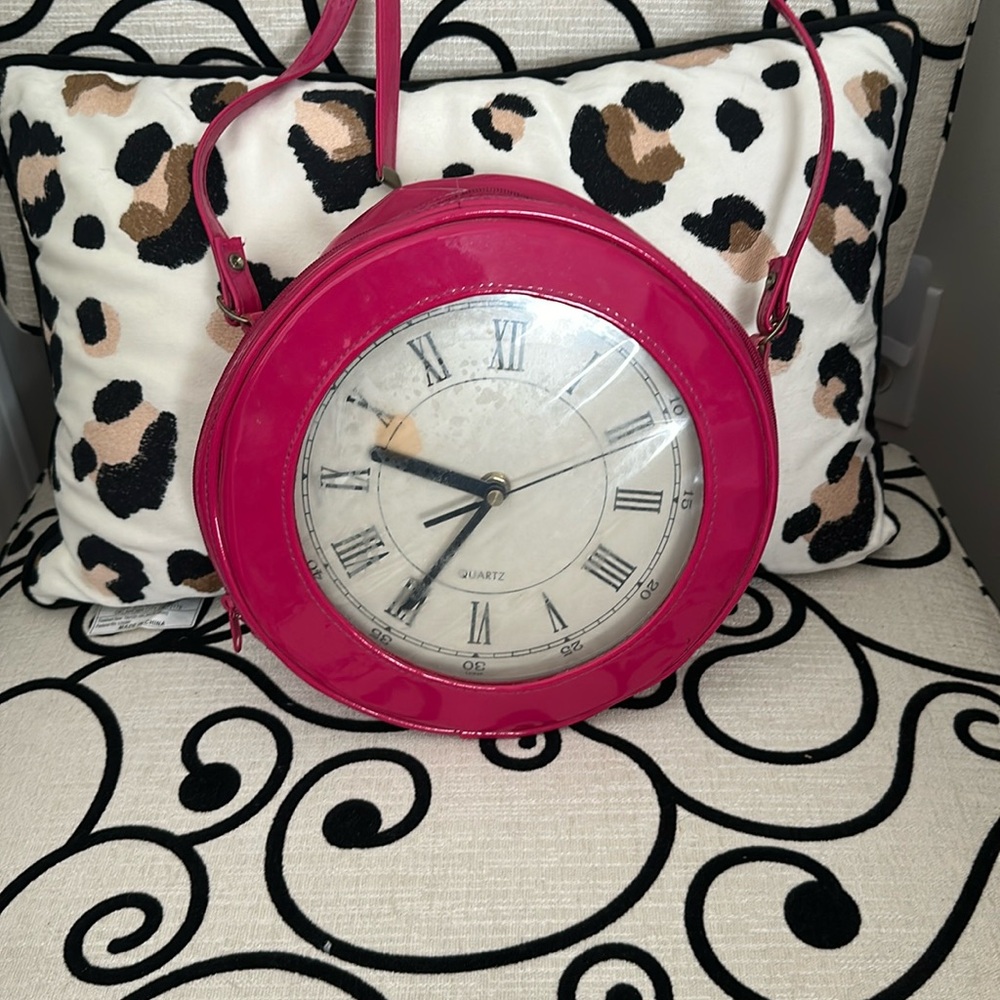 Unique clock purse in pink with shoulder strap and working timepiece clock